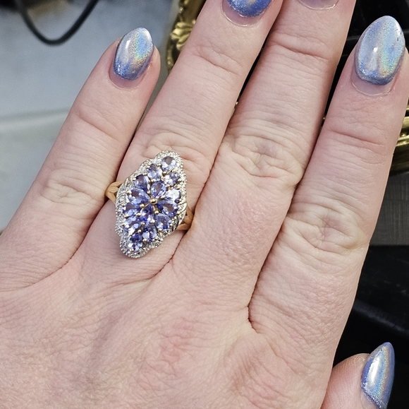 New. 10k tanzanite & diamond ring size 7. Can be resized by a jeweler. Stamped 1 - Picture 7 of 9